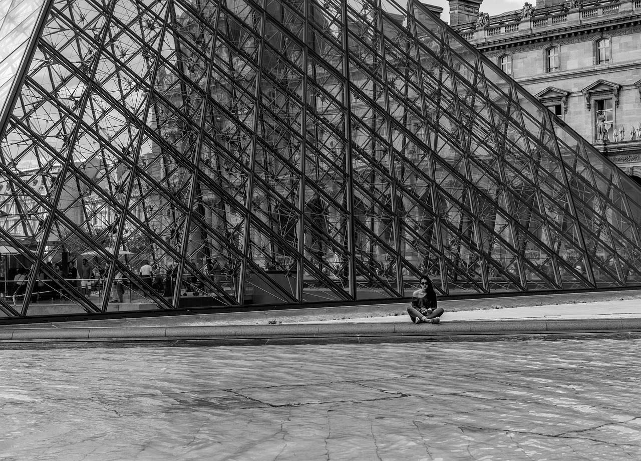 pyramid  louvre  woman free photo