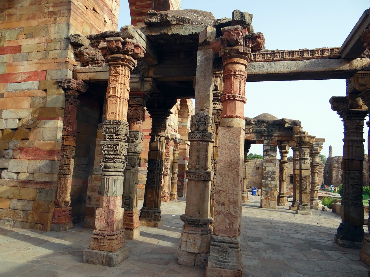 qutab complex pillars carved free photo