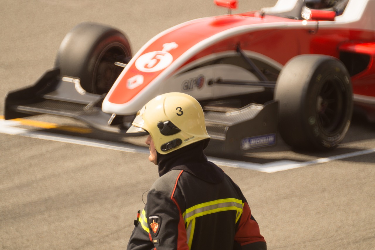 race car formula one fireman free photo