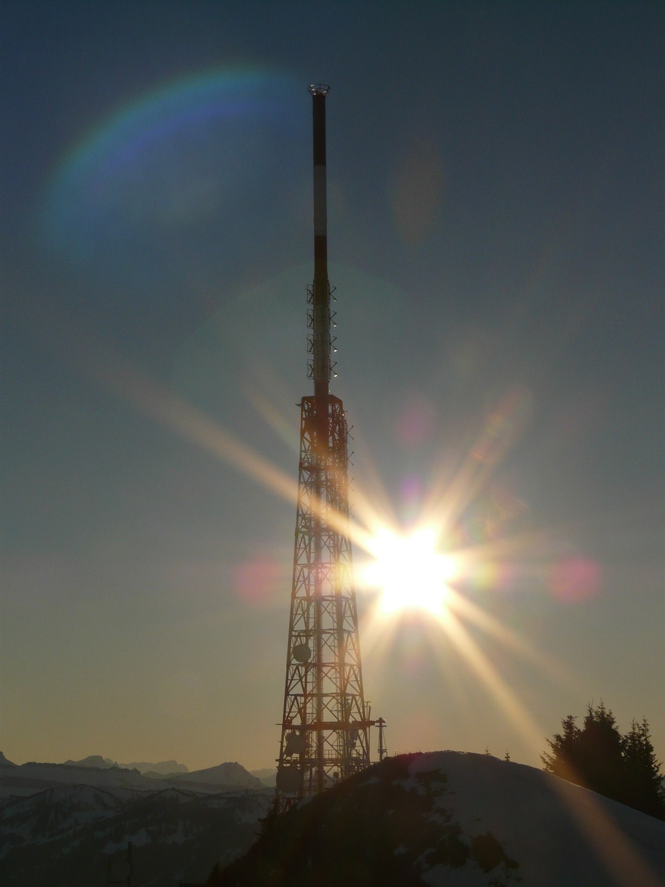 radio tower,radio mast,greened,transmission tower,back light,sun,sky,free pictures, free photos, free images, royalty free, free illustrations, public domain