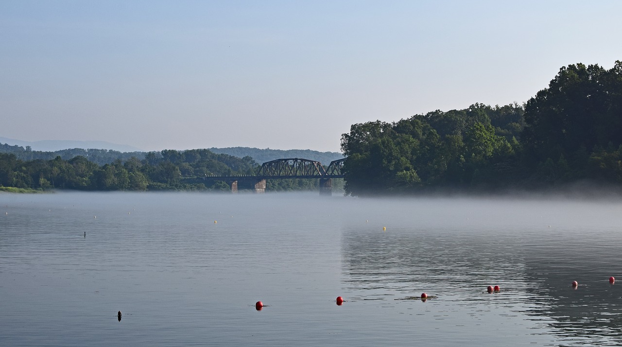 railroad bridge on foggy morning fog dawn free photo