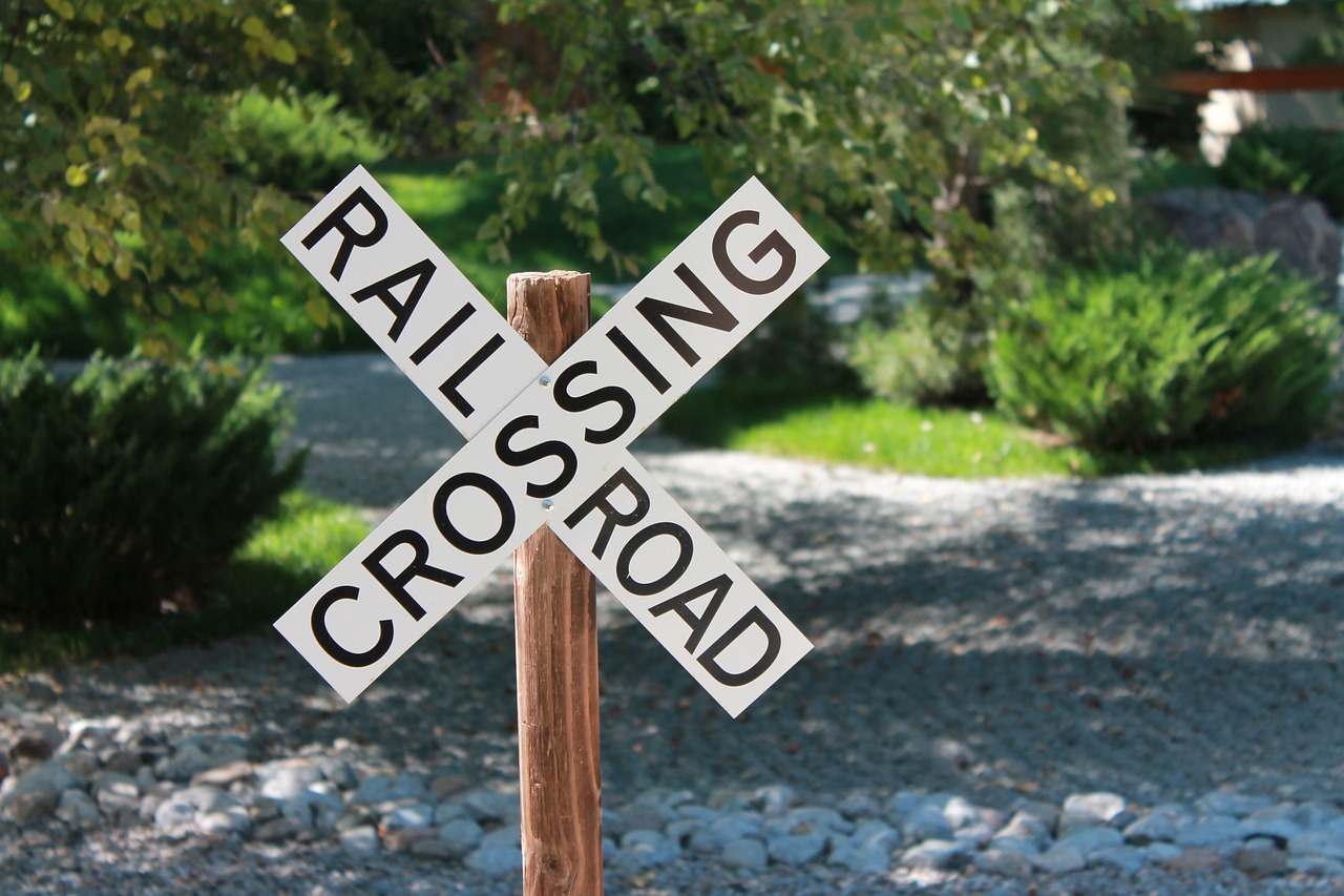 railroad crossing sign train railway free photo