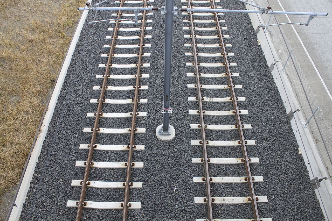 railroad tracks overhead gravel free photo
