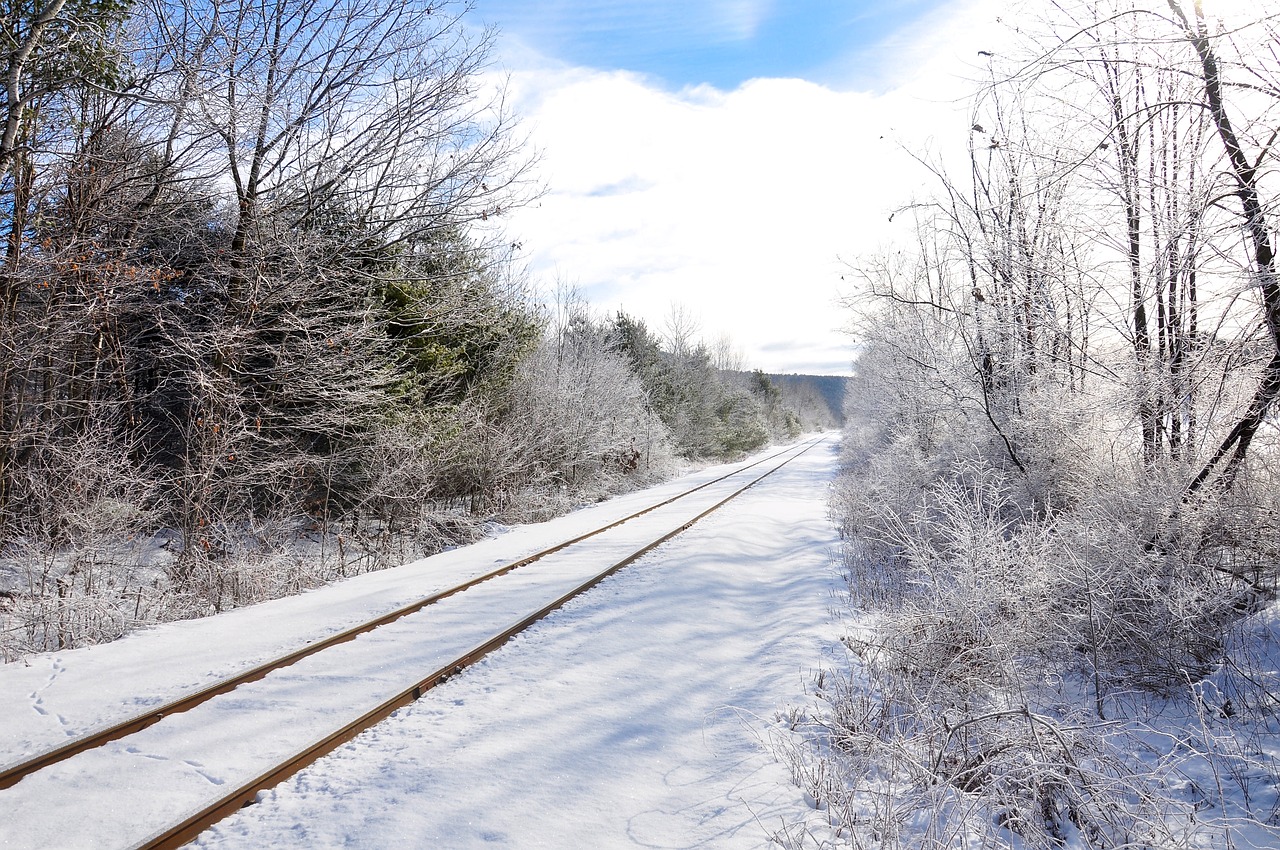 railroad tracks snow winter free photo