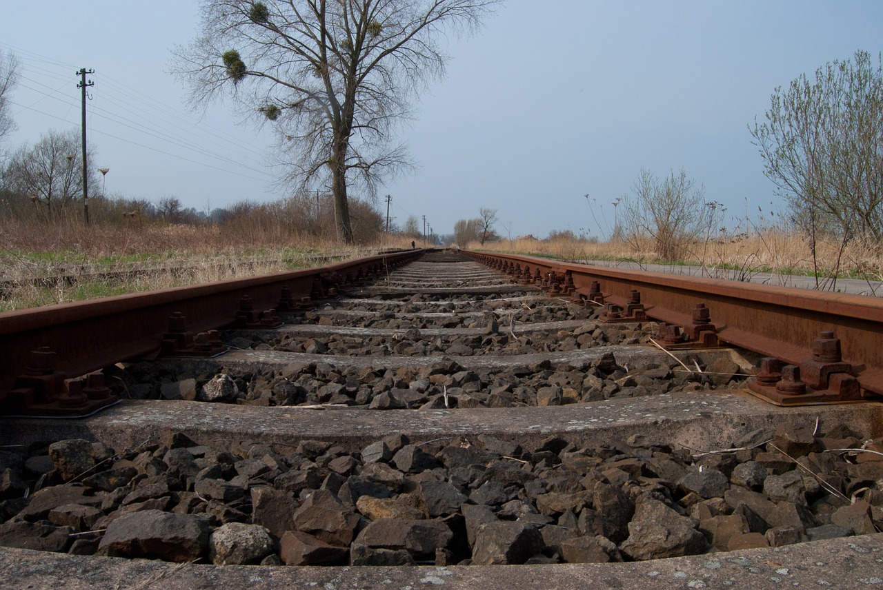 railroad tracks railway sleepers free photo