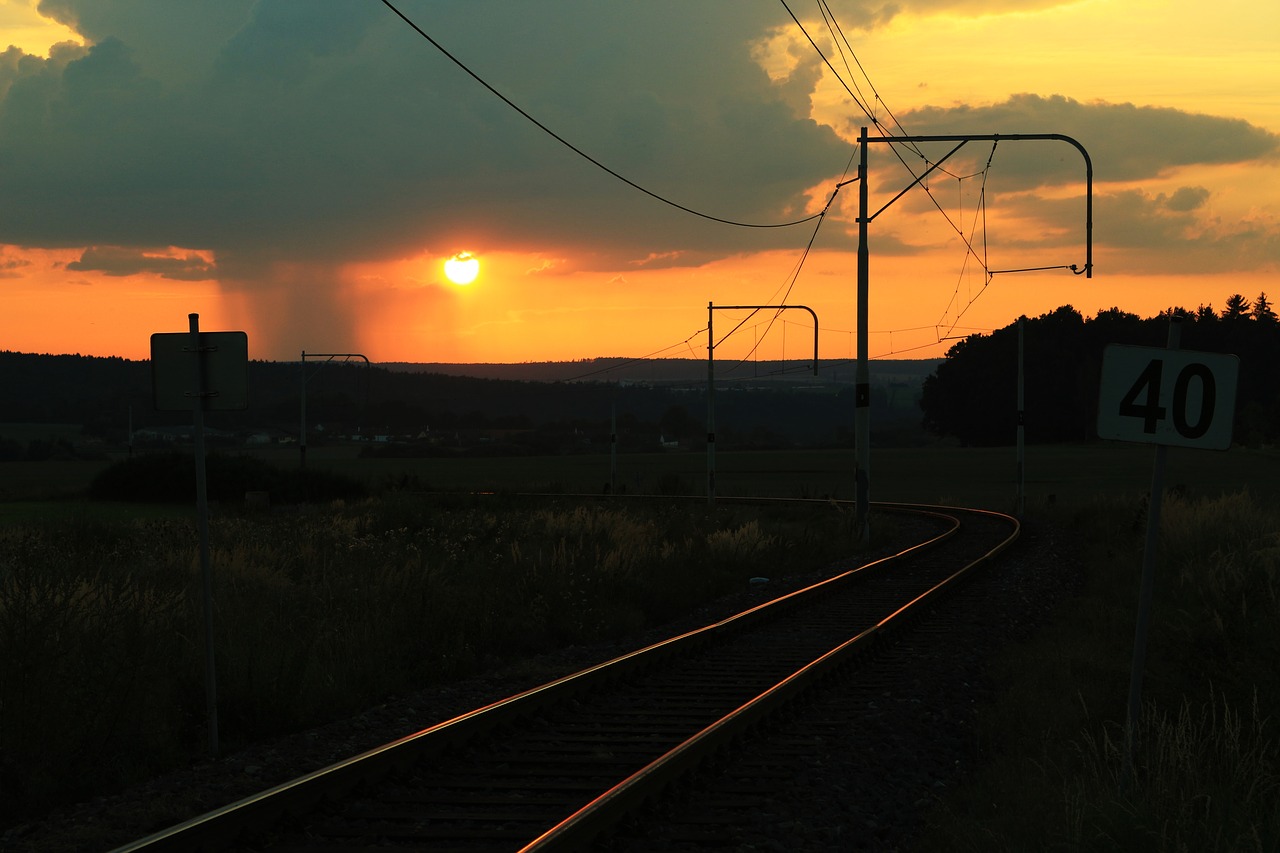 railway sunset thunderstorm free photo