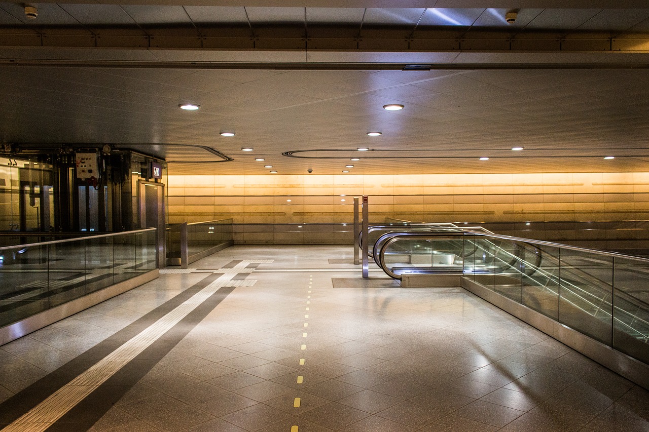 railway station passage escalator free photo