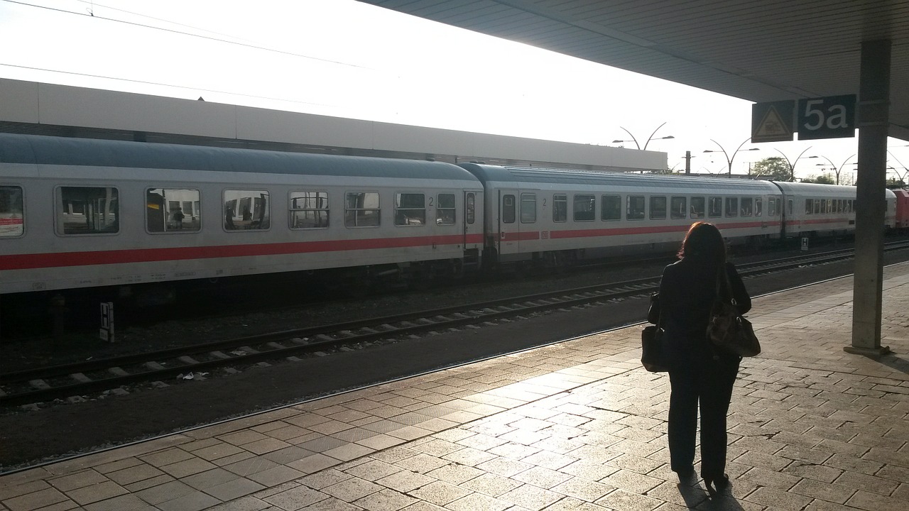 railway station travel woman free photo