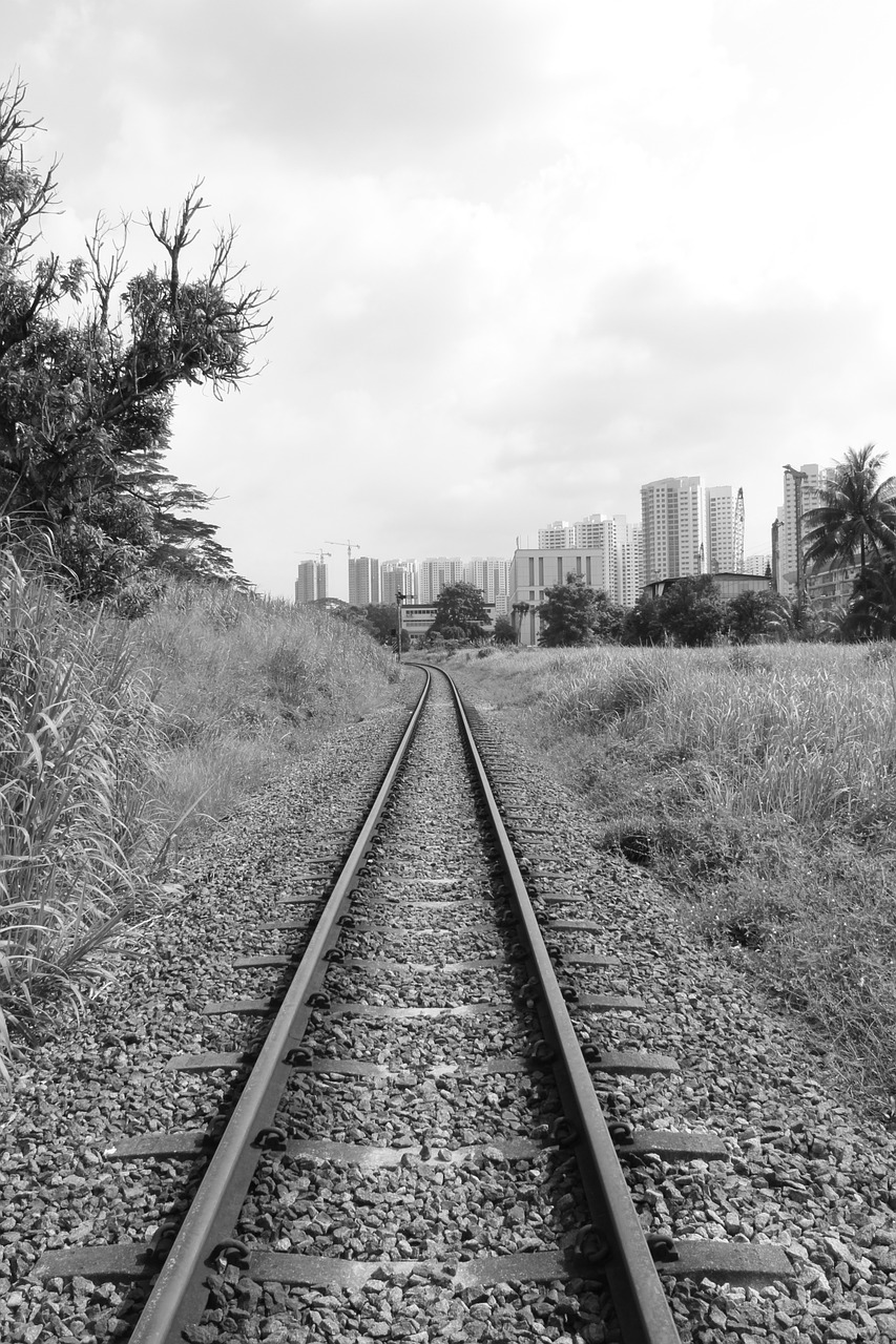 railway tracks train tracks black and white free photo