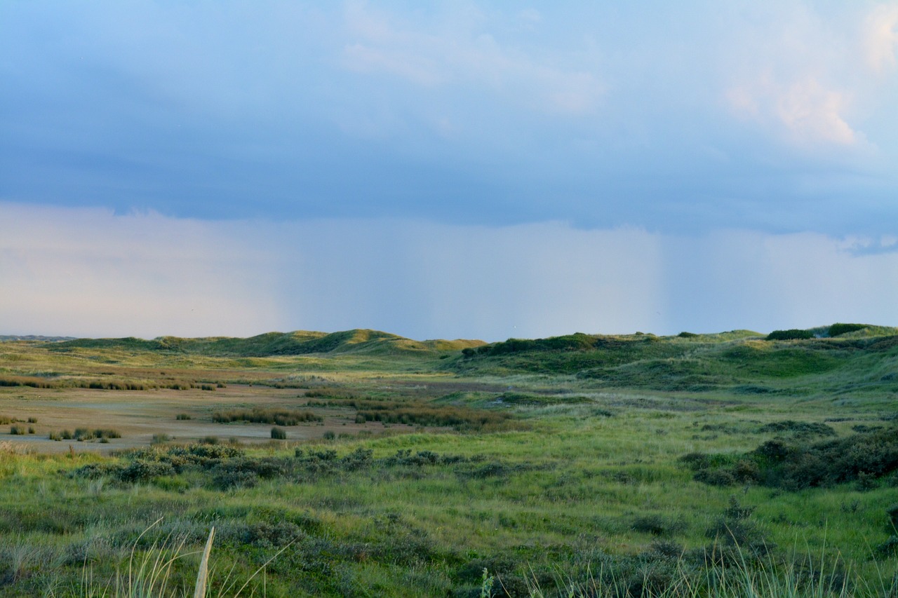 rain dunes clouds free photo