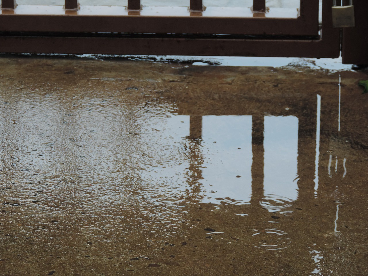 rain gate sidewalk free photo