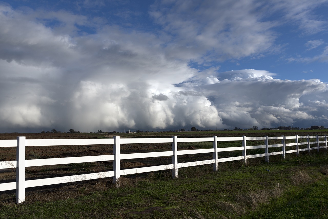 rain clouds white fence pasture free photo