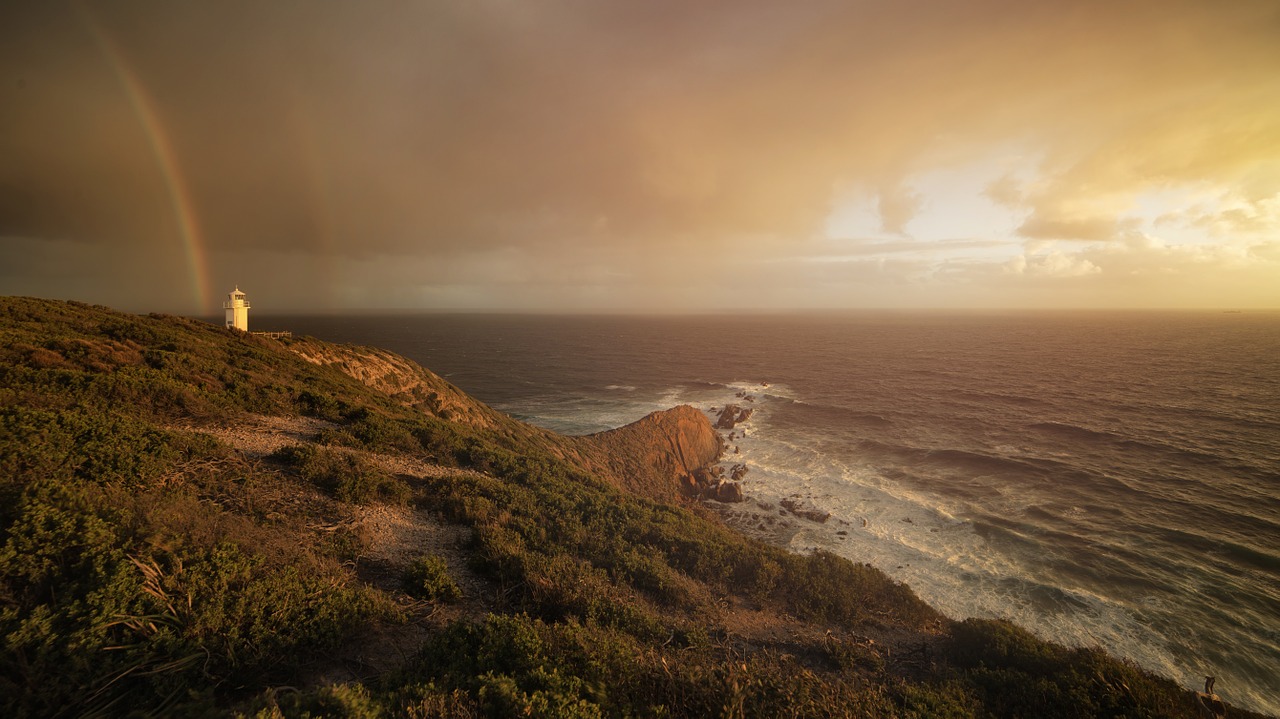 rainbow lighthouse sunset free photo