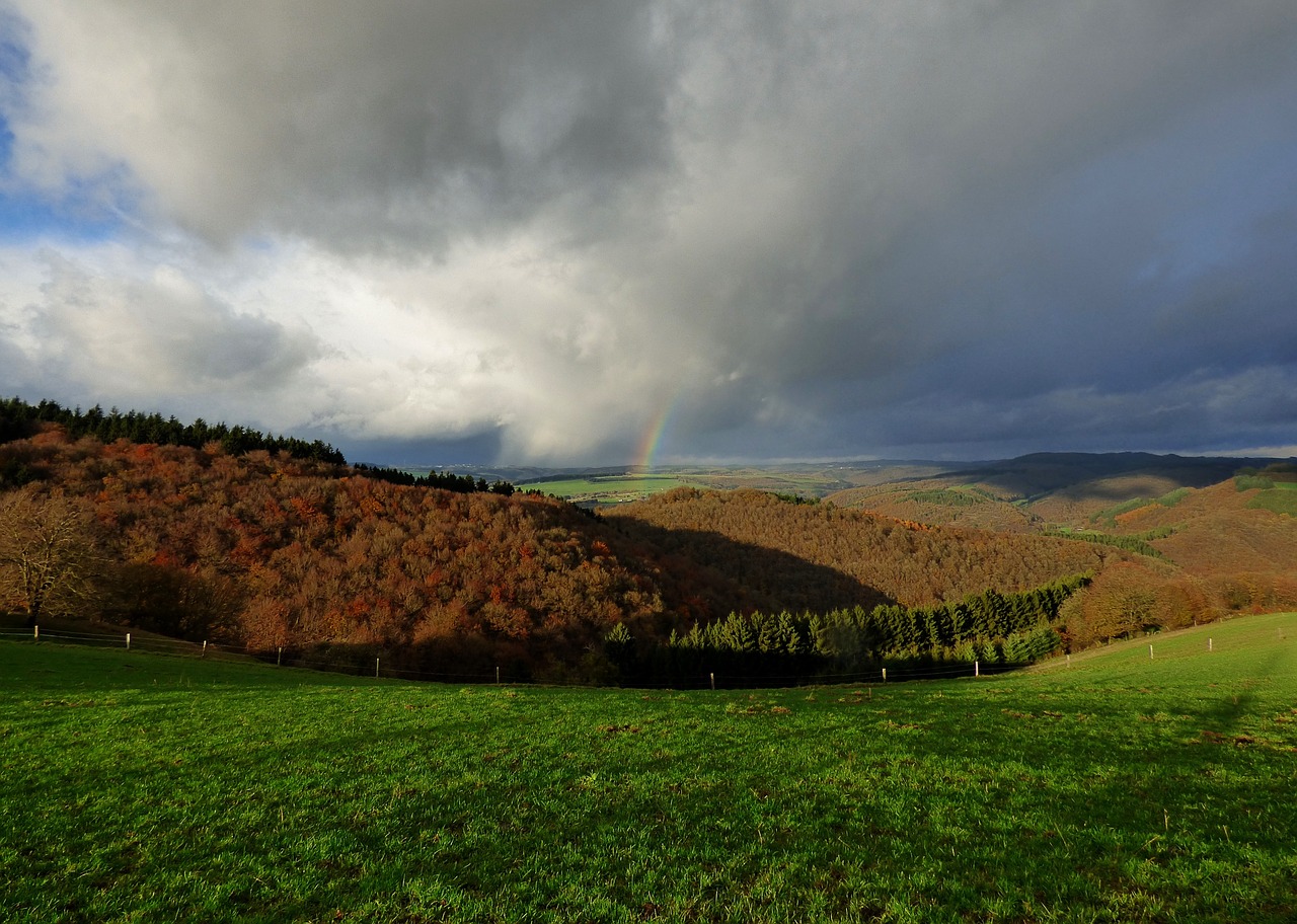 rainbow storm threatening sky free photo