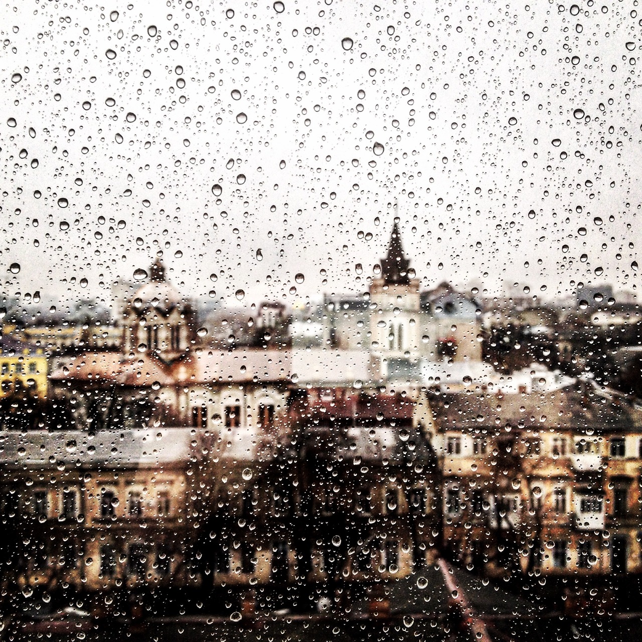 rainy day cityscape window free photo