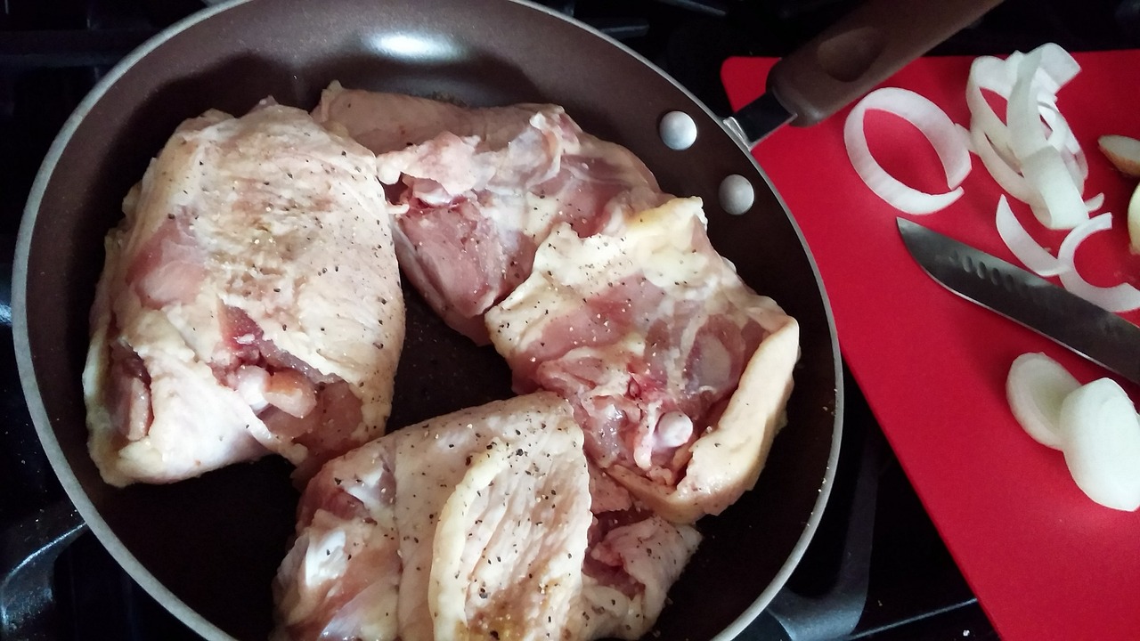 raw chicken fry pan cutting board free photo