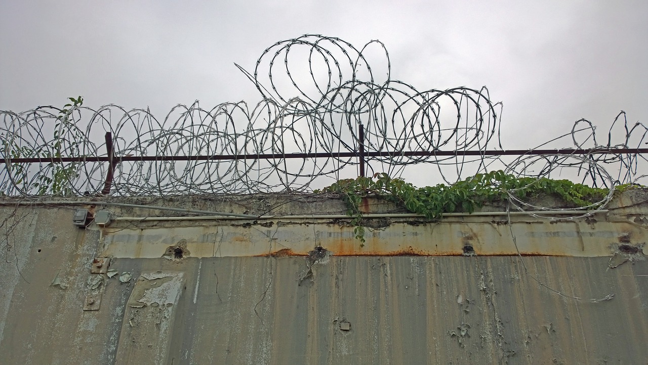 razor wire prison fence free photo