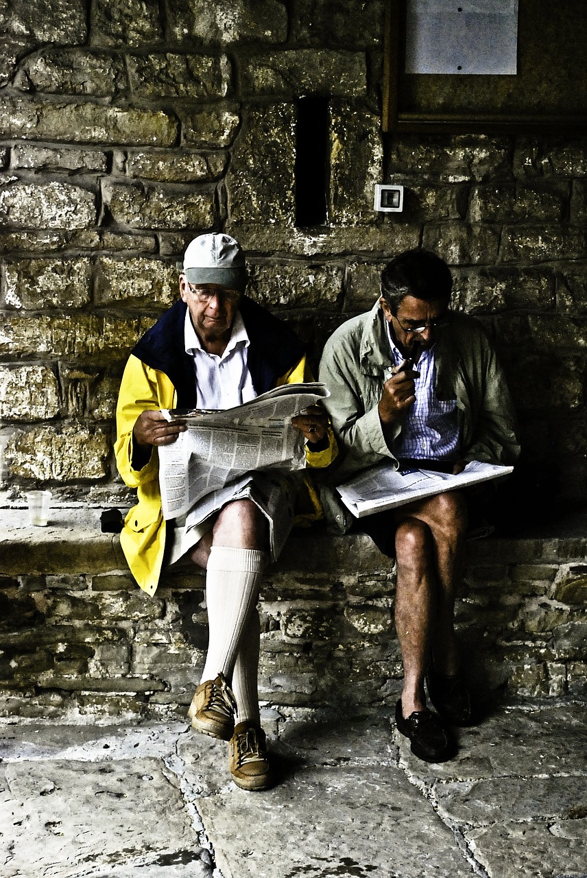 reading men newspaper free photo