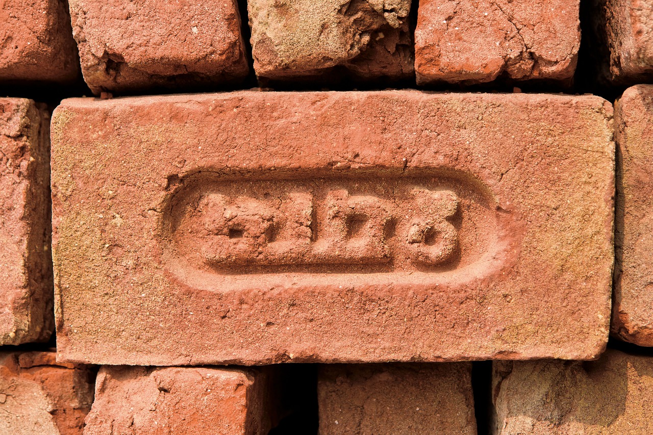 red brick inscriptive free photo
