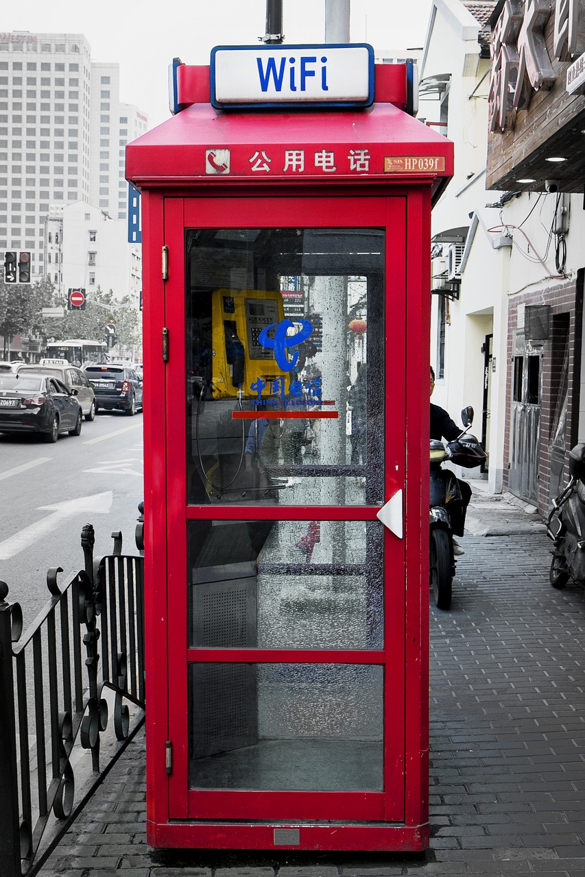 red telephone booth street free photo