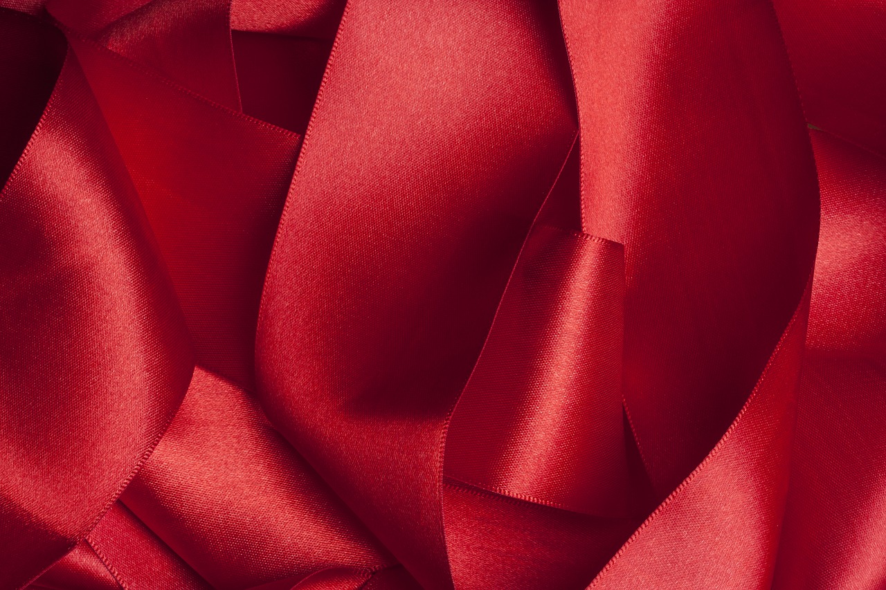 red fabric textile free photo