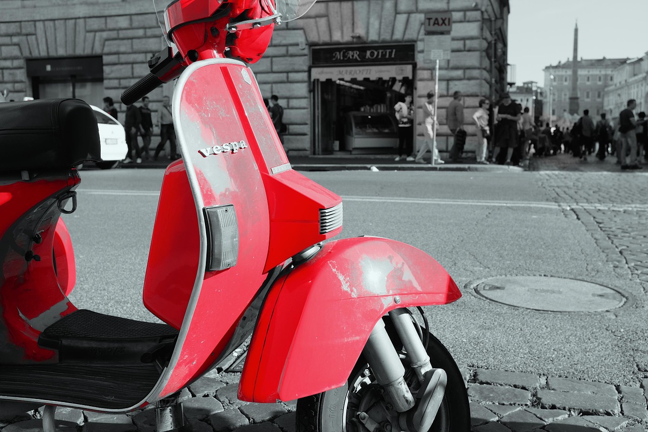 red vespa scooter free photo