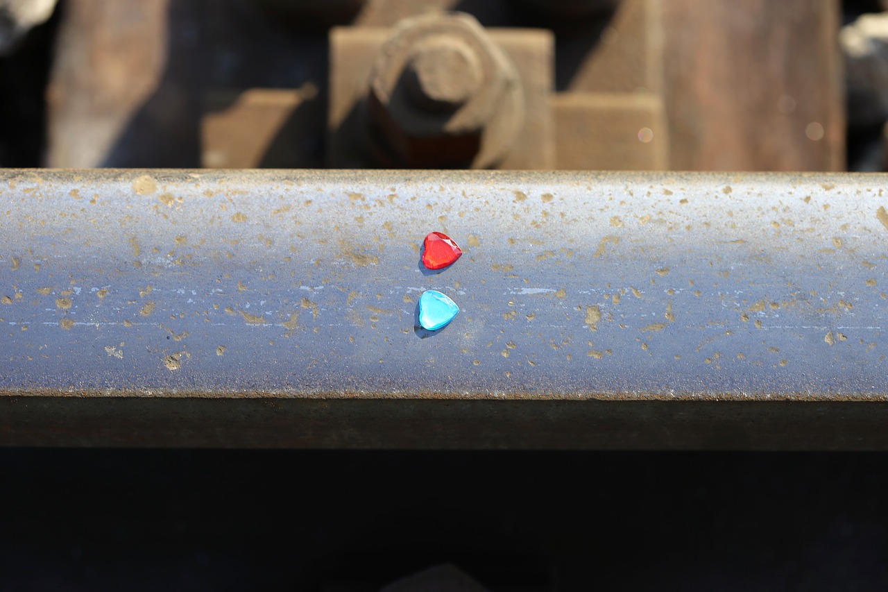 red and blue heart on railway stop children and teenager suicide remembering those kids free photo