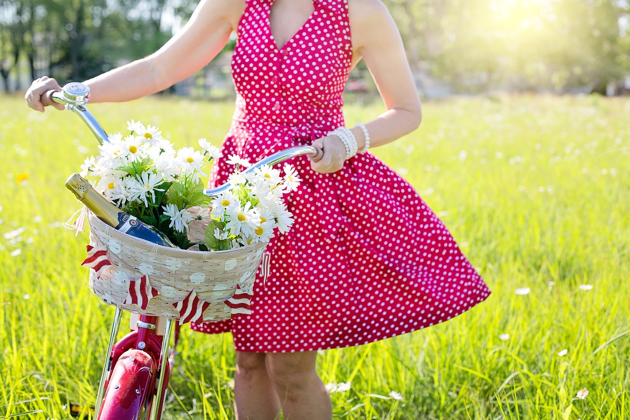red bicycle  woman  red dress free photo
