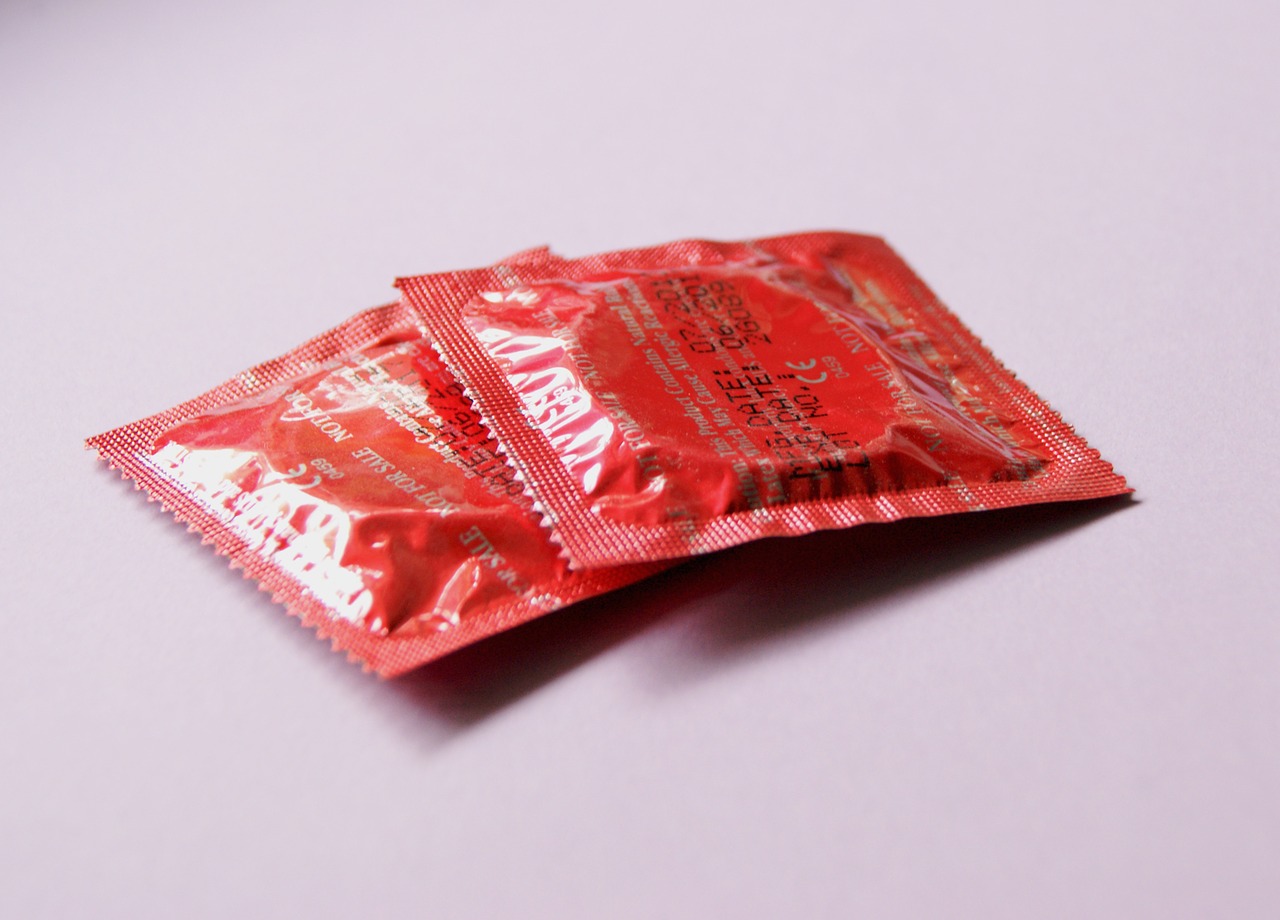 red condoms contraception contraceptives free photo