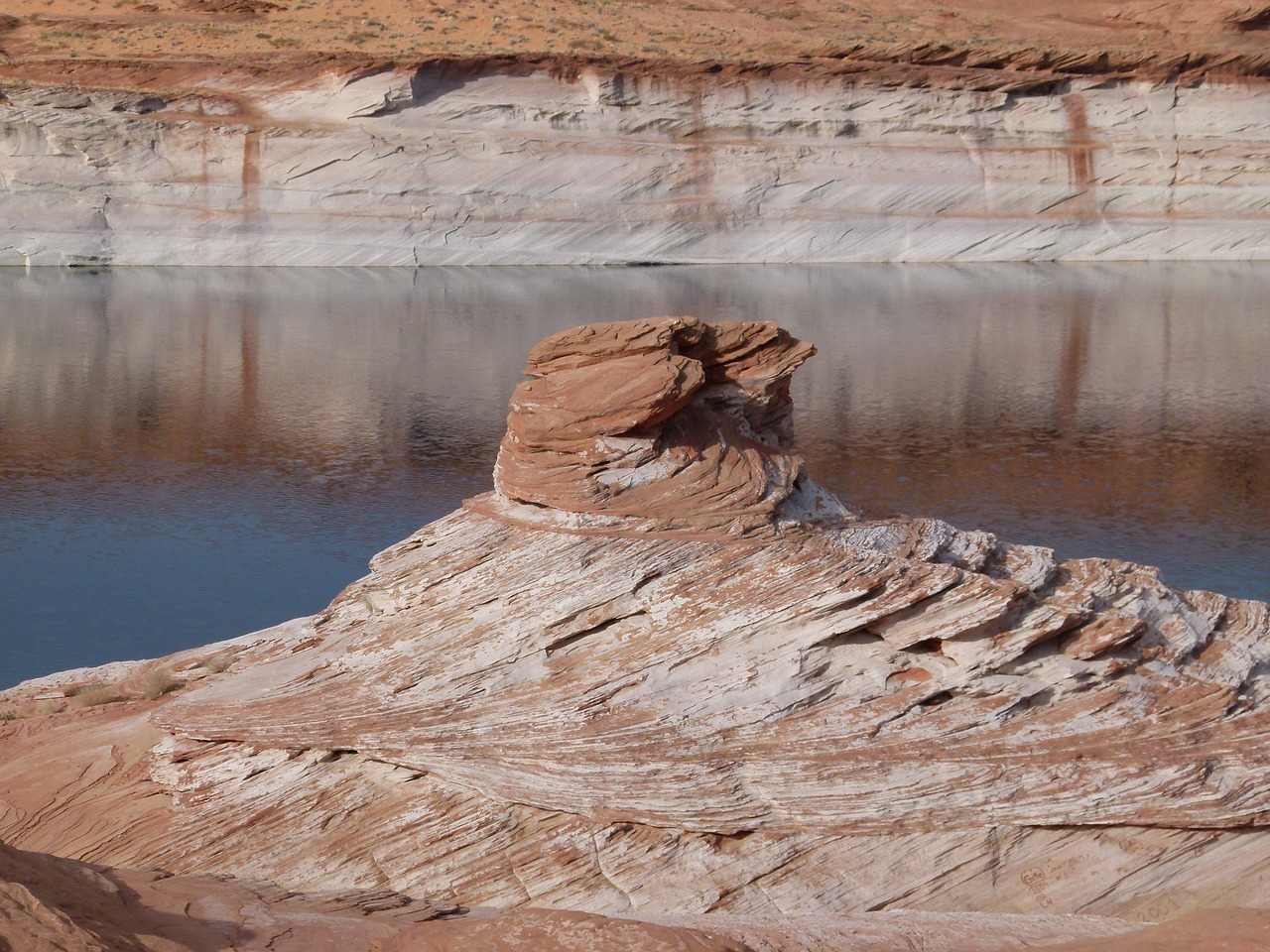 red rock formation reflection free photo