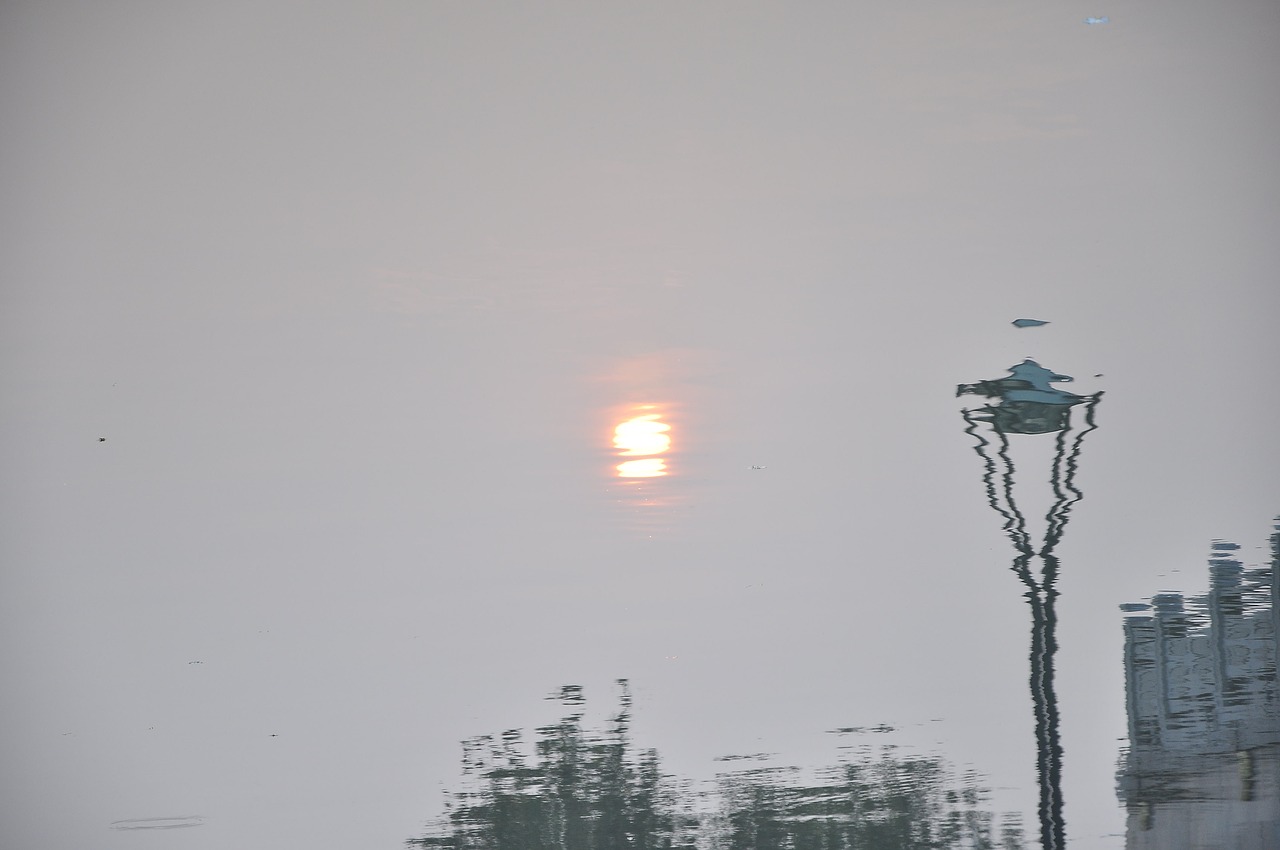 reflection sunrise street lamp free photo