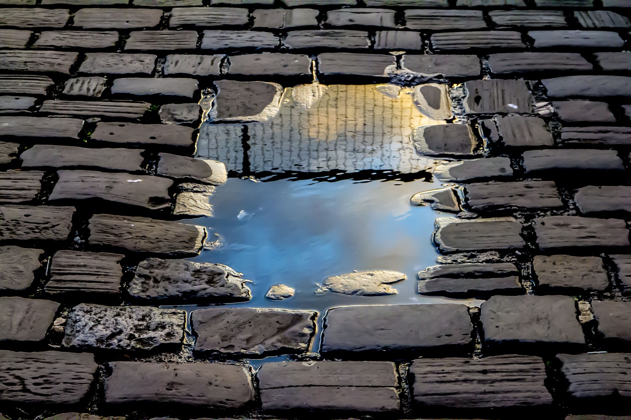 reflection brick road rain free photo