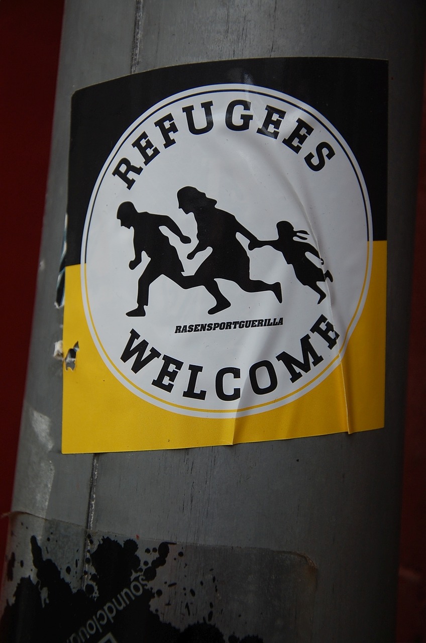 refugees welcome sticker free photo