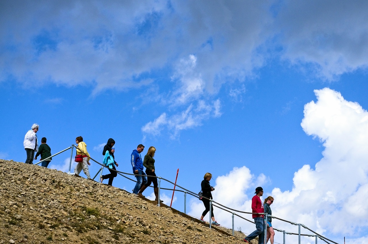 rendezvous mountain visitors  sky  clouds free photo