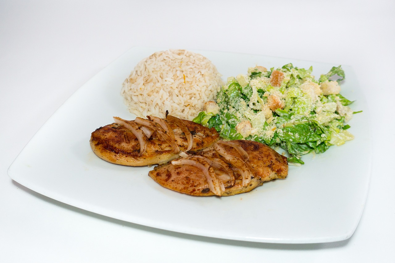 rice  caesar salad  grilled chicken free photo