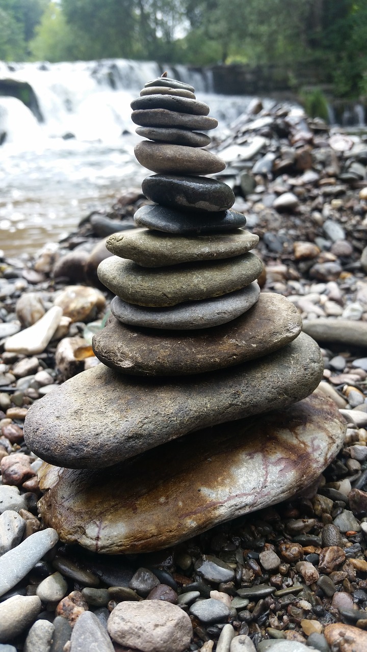 river stones tower free photo