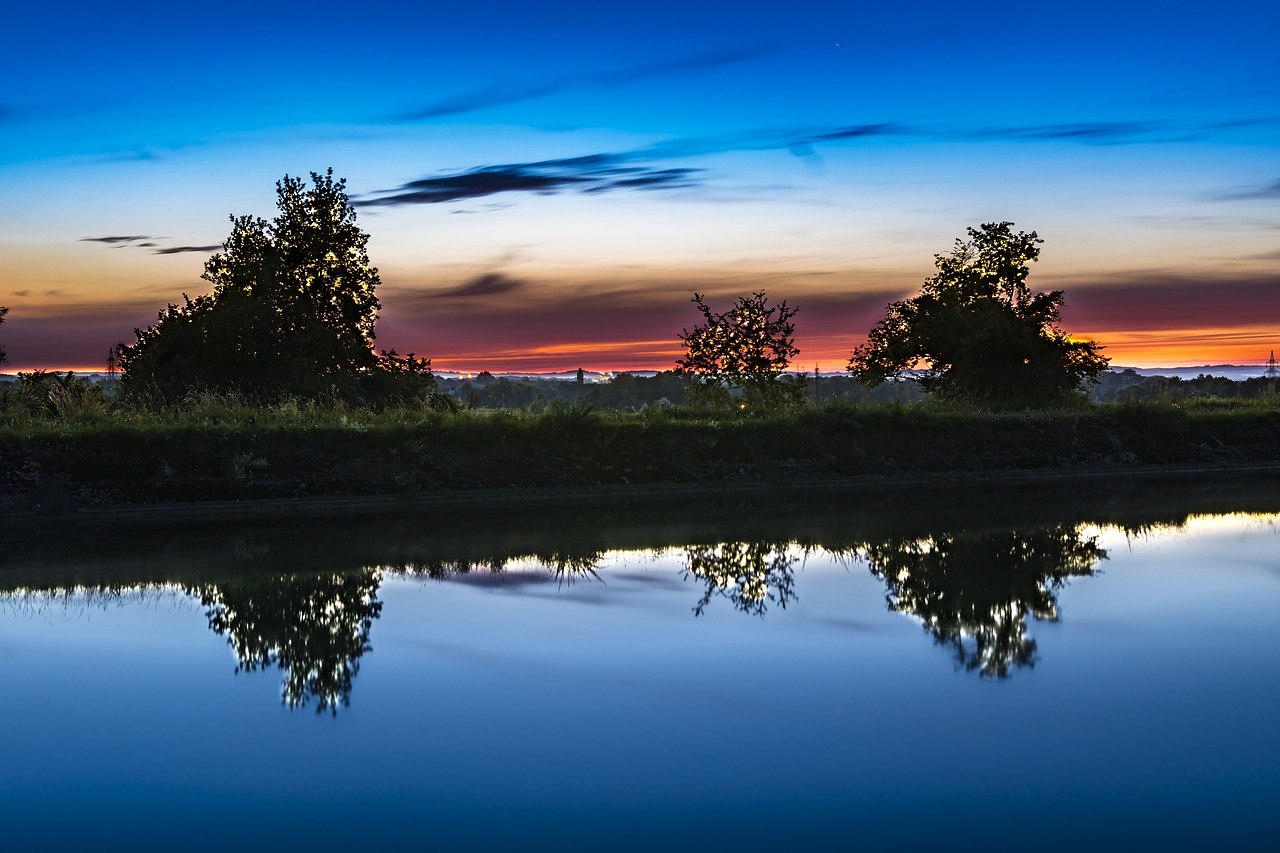 river mirroring water free photo