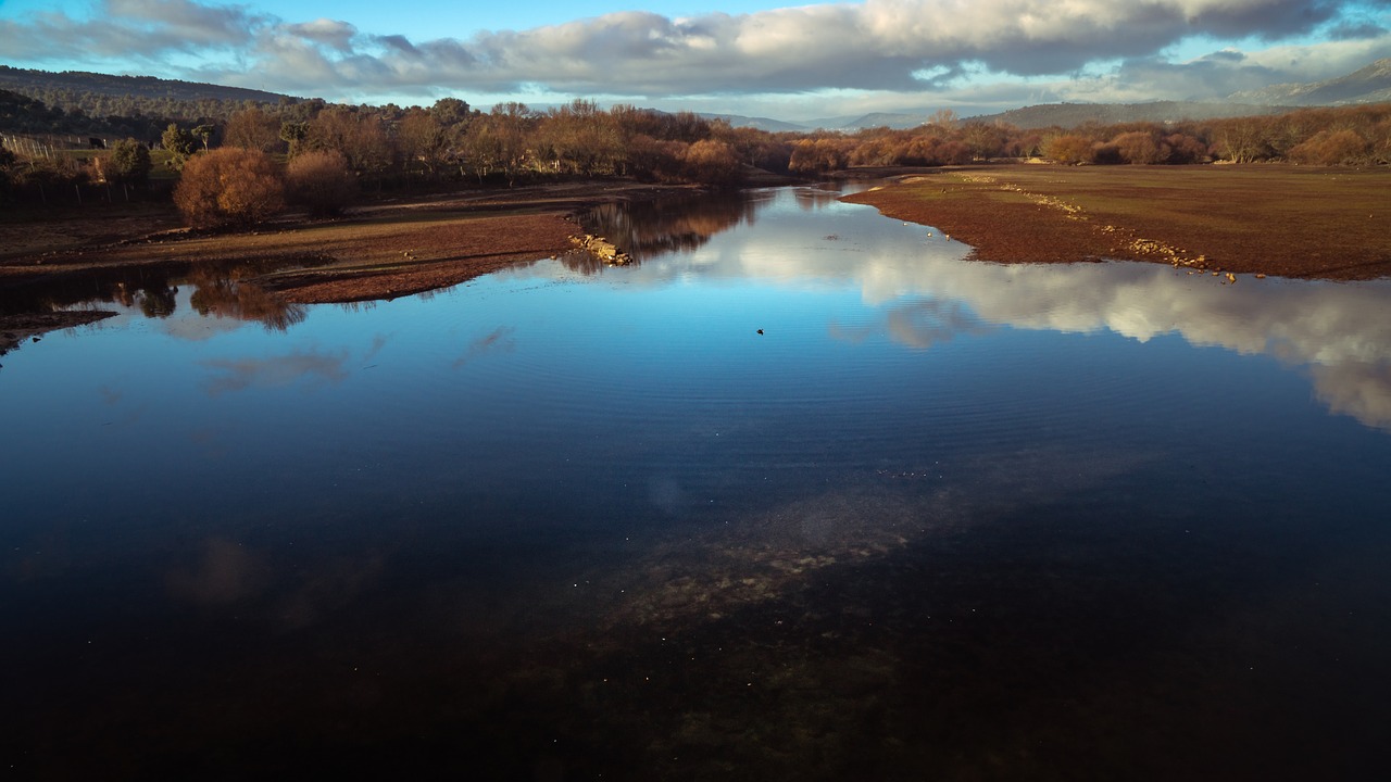 river  reflection  clouds free photo