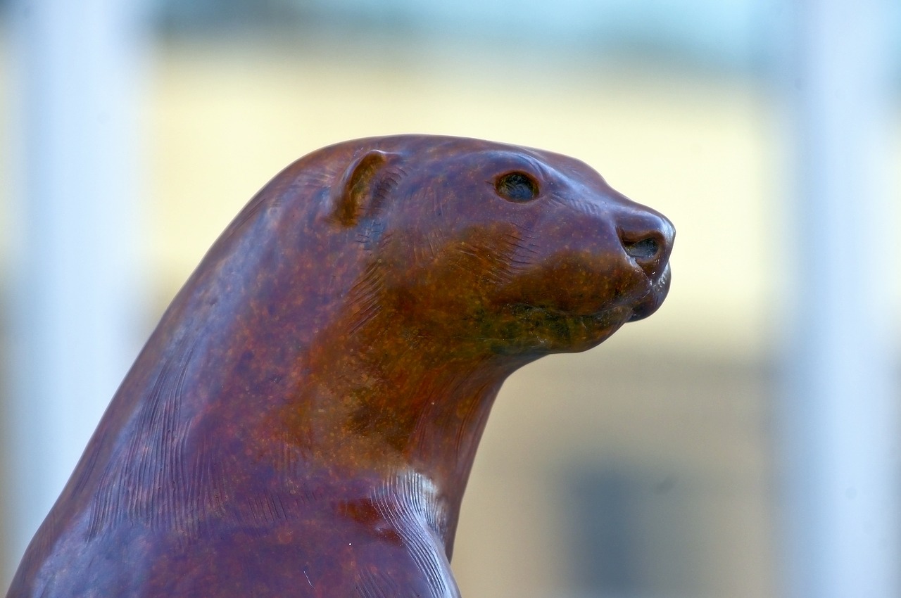 river king  river otter  sculpture free photo