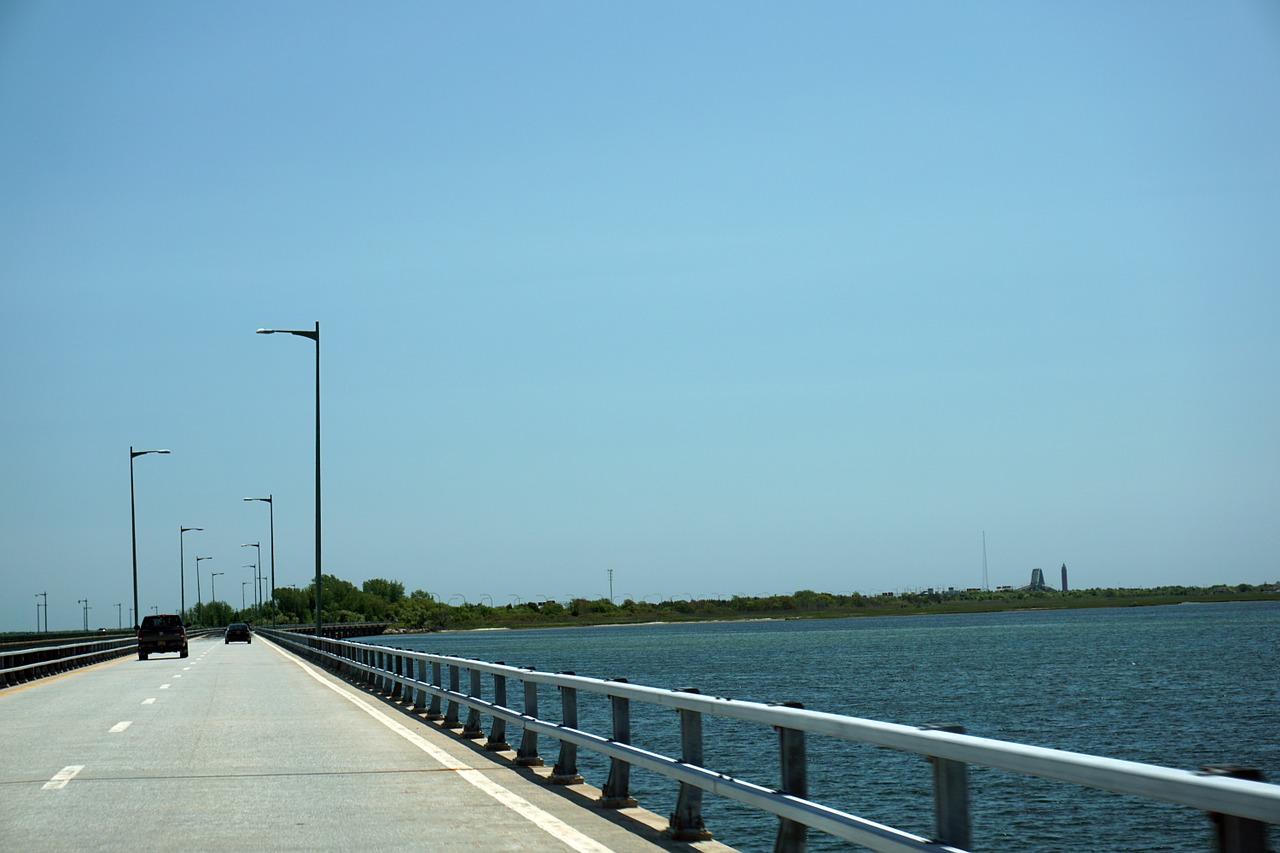 road bridge beach day free photo