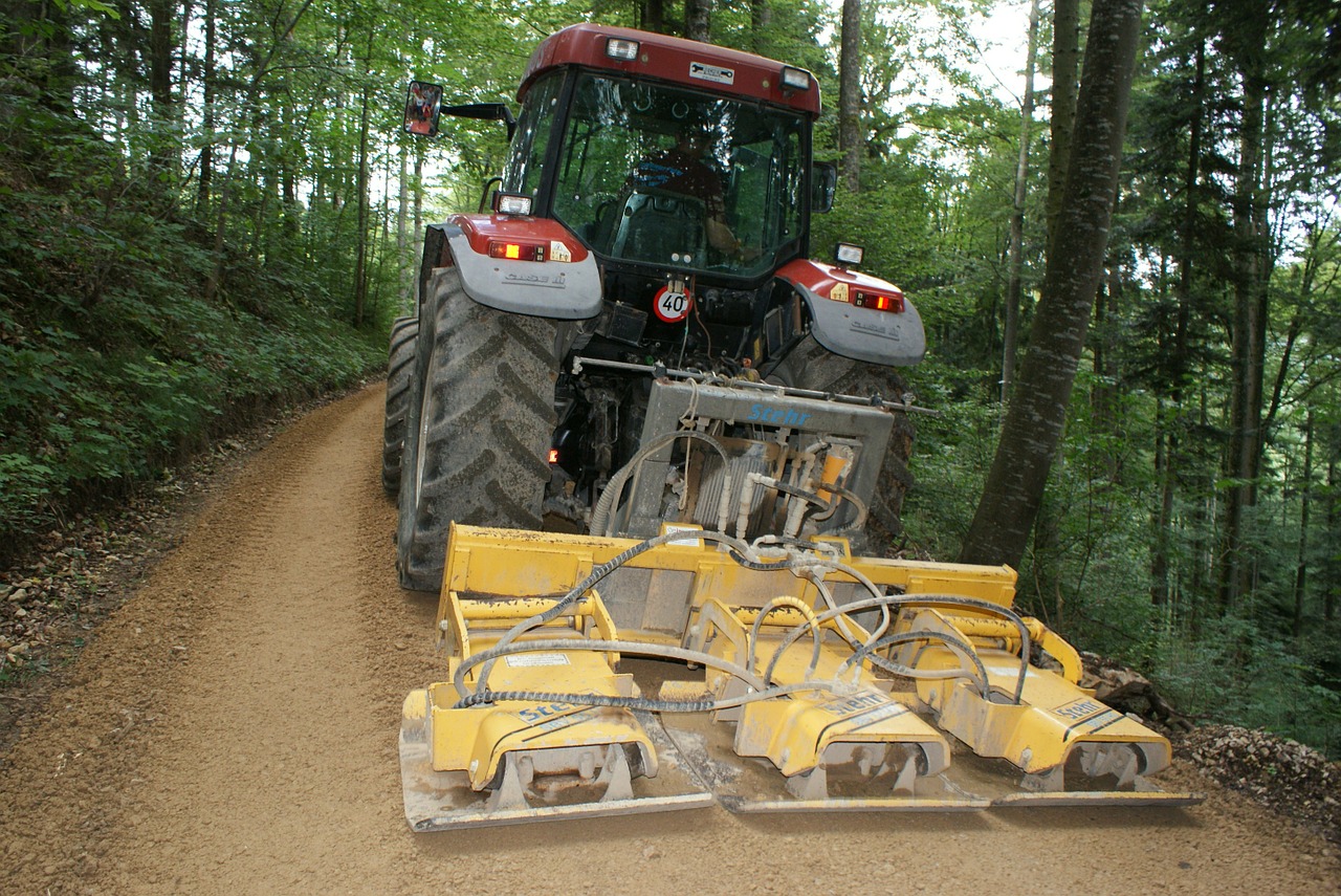 road construction forest path tractor free photo