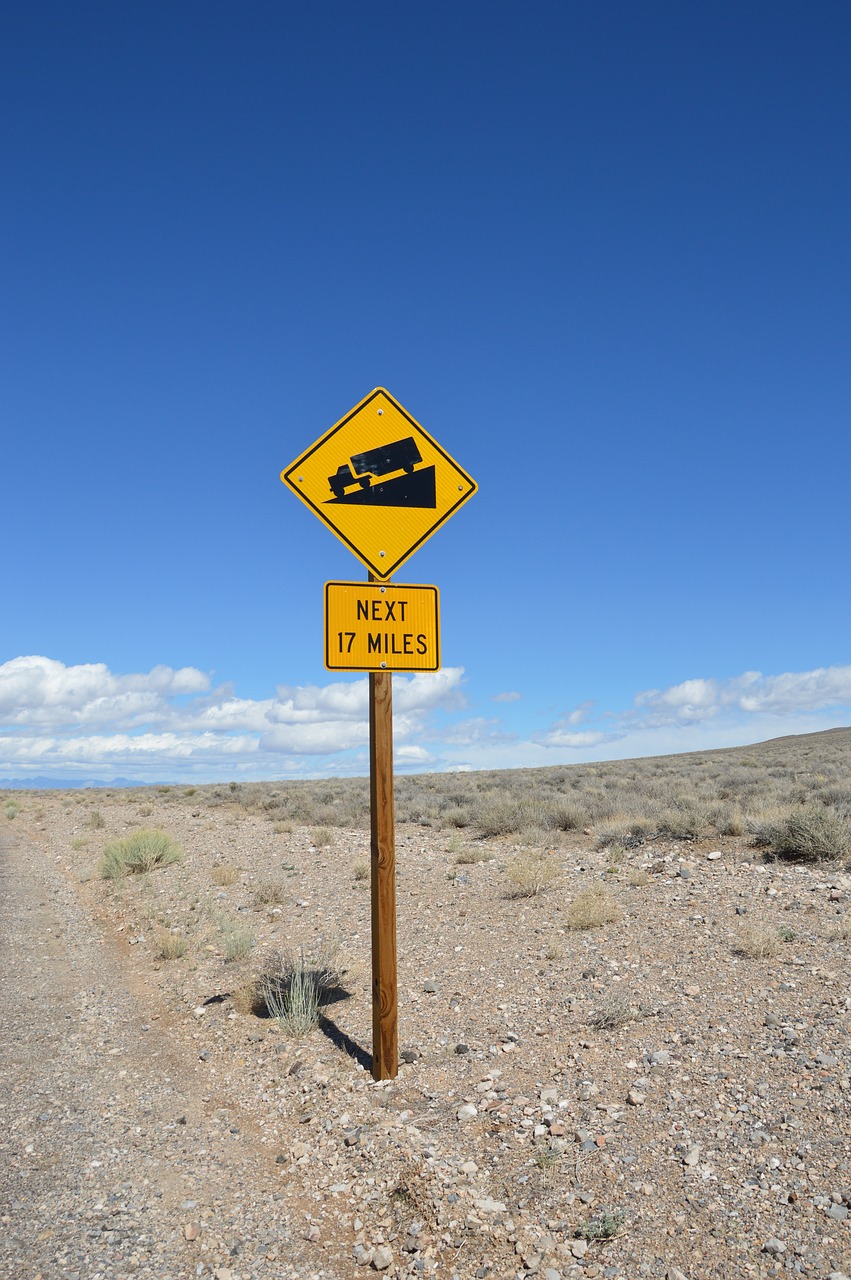 road sign  death valley  traffic free photo