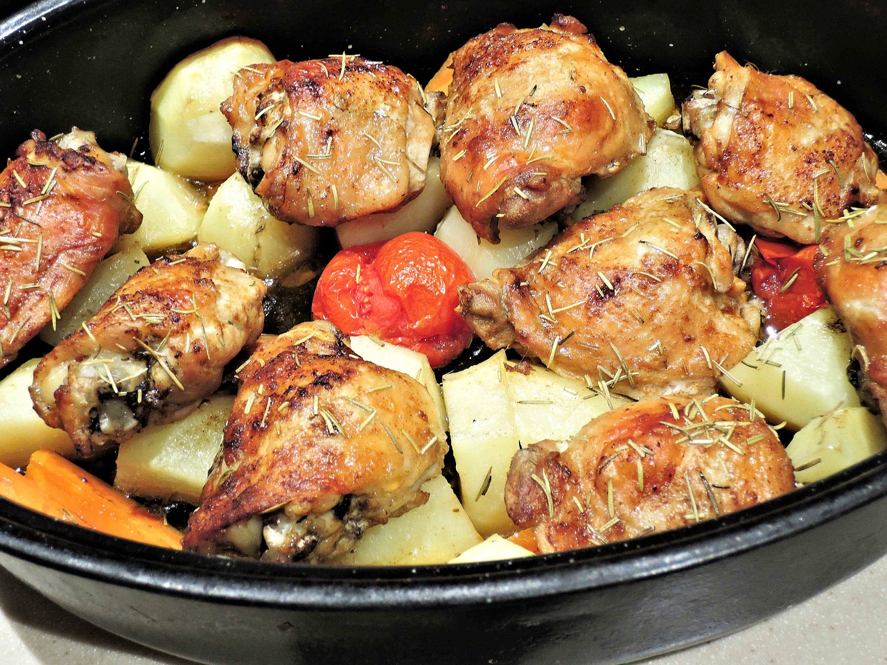 roasted chicken thighs potatoes carrots free photo