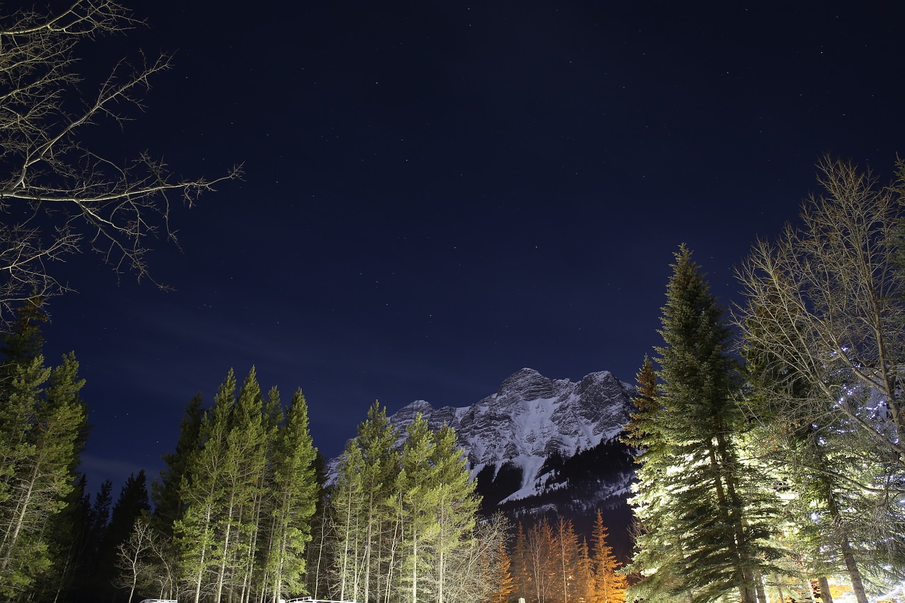 rockies snow the night sky free photo