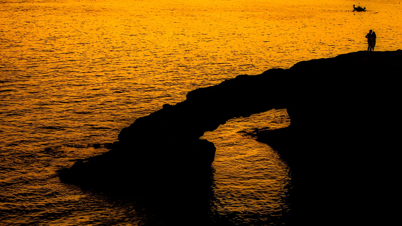 rock sunset sea free photo