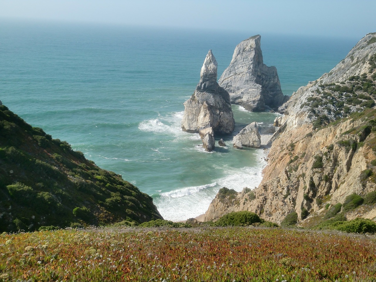 rock sea cliff free photo