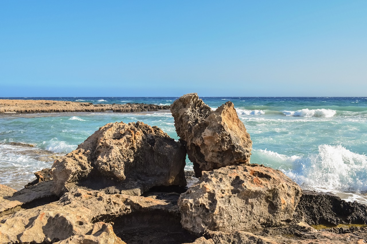 rock rocky coast wave free photo