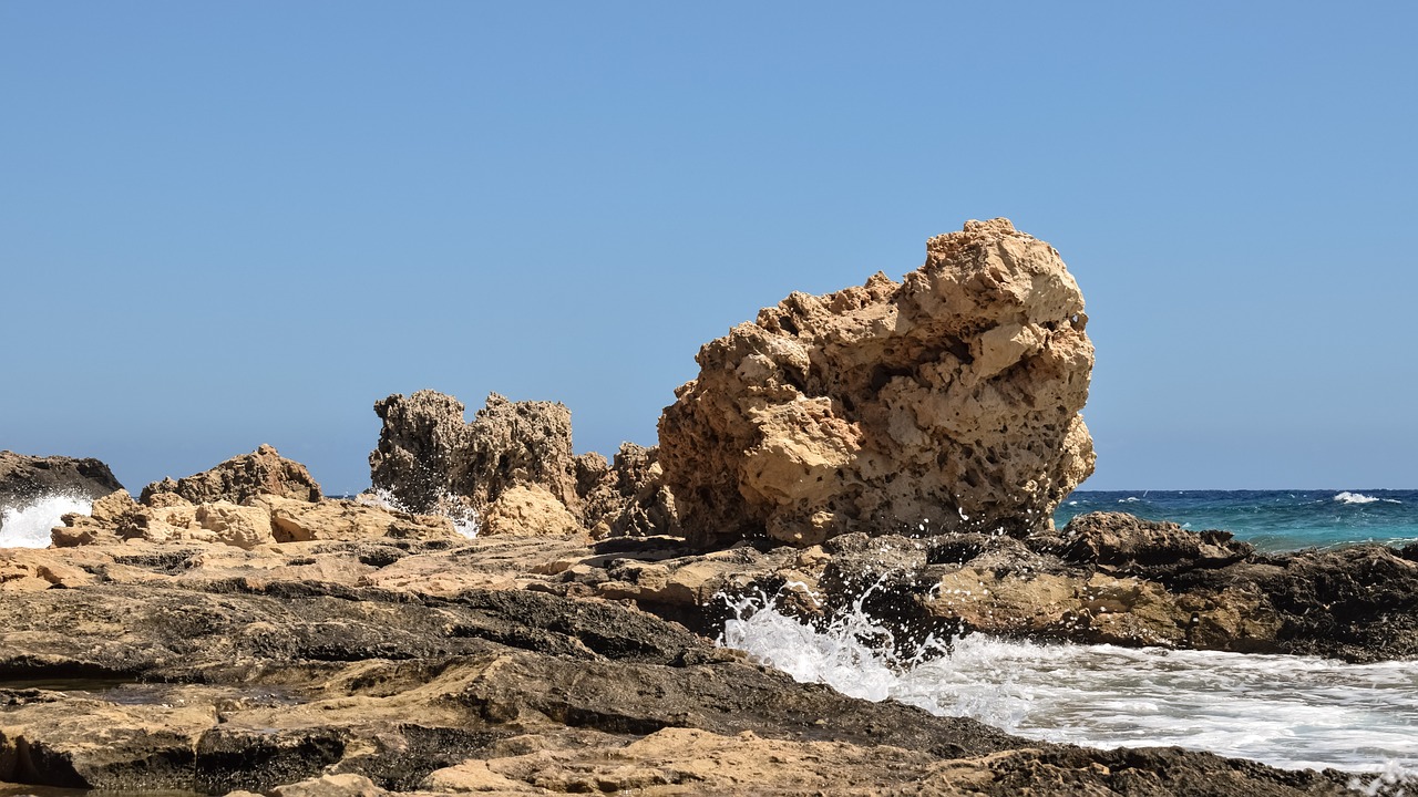 rock rocky coast sea free photo