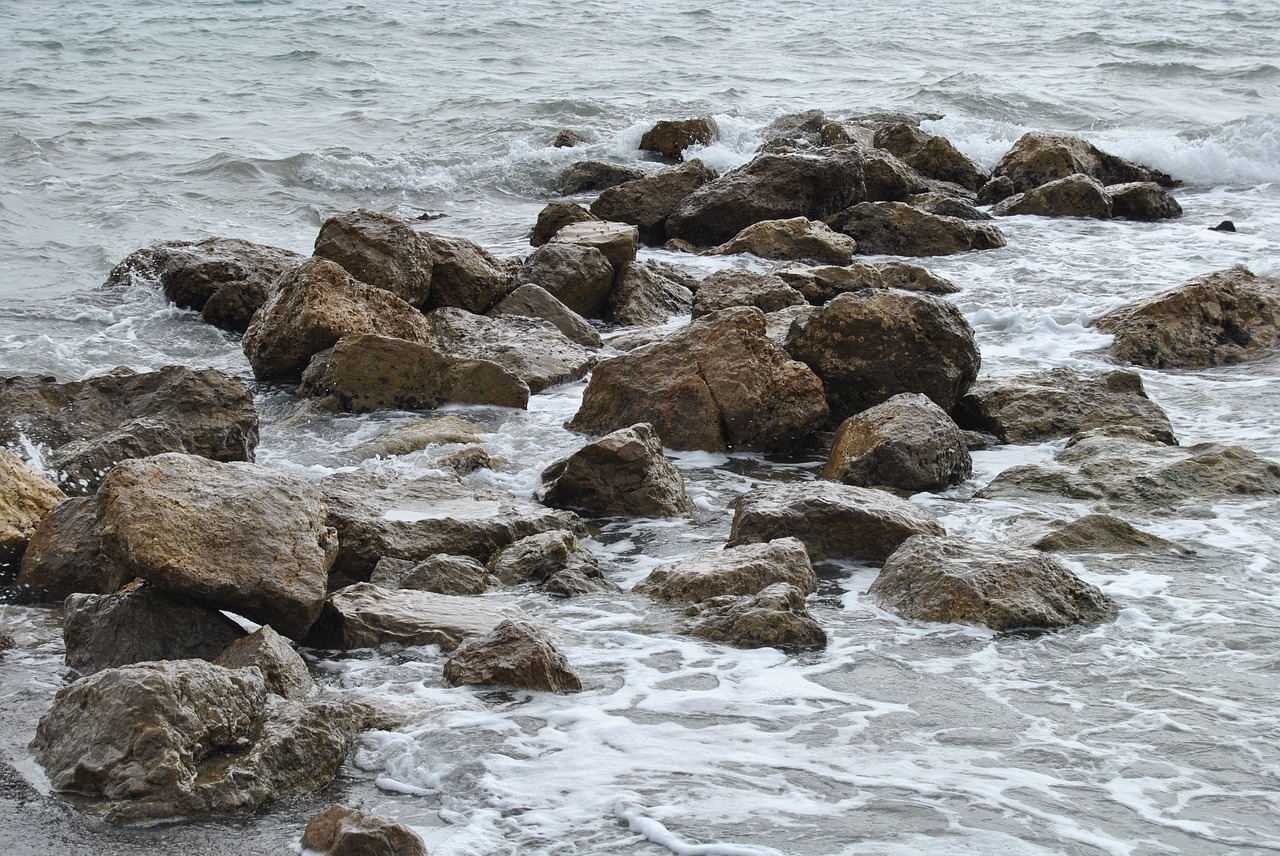 rock stones in the sea beach free photo