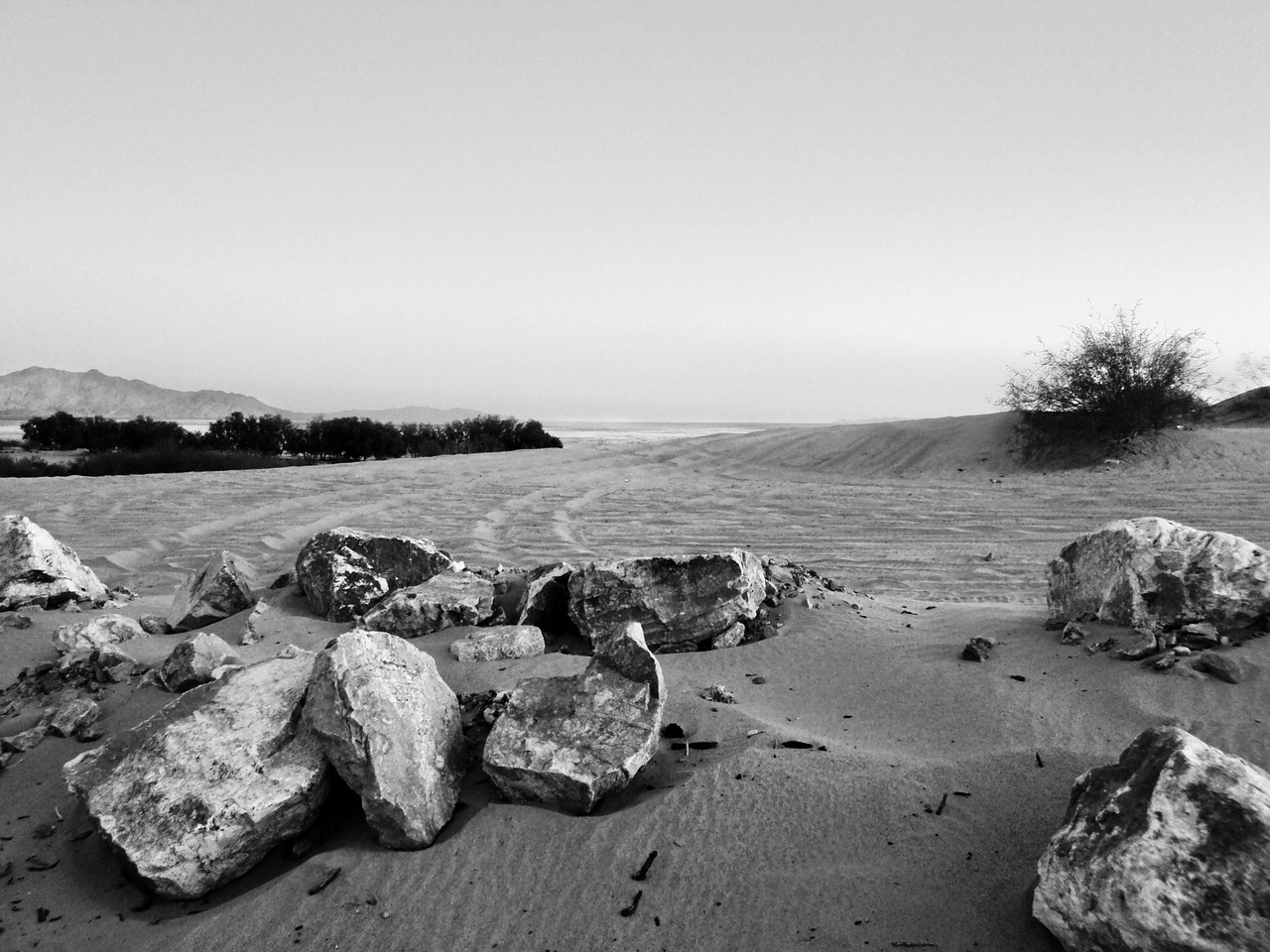 rock landscape body of water free photo